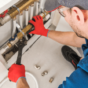 Moller's Plumbing technician working on residential plumbing